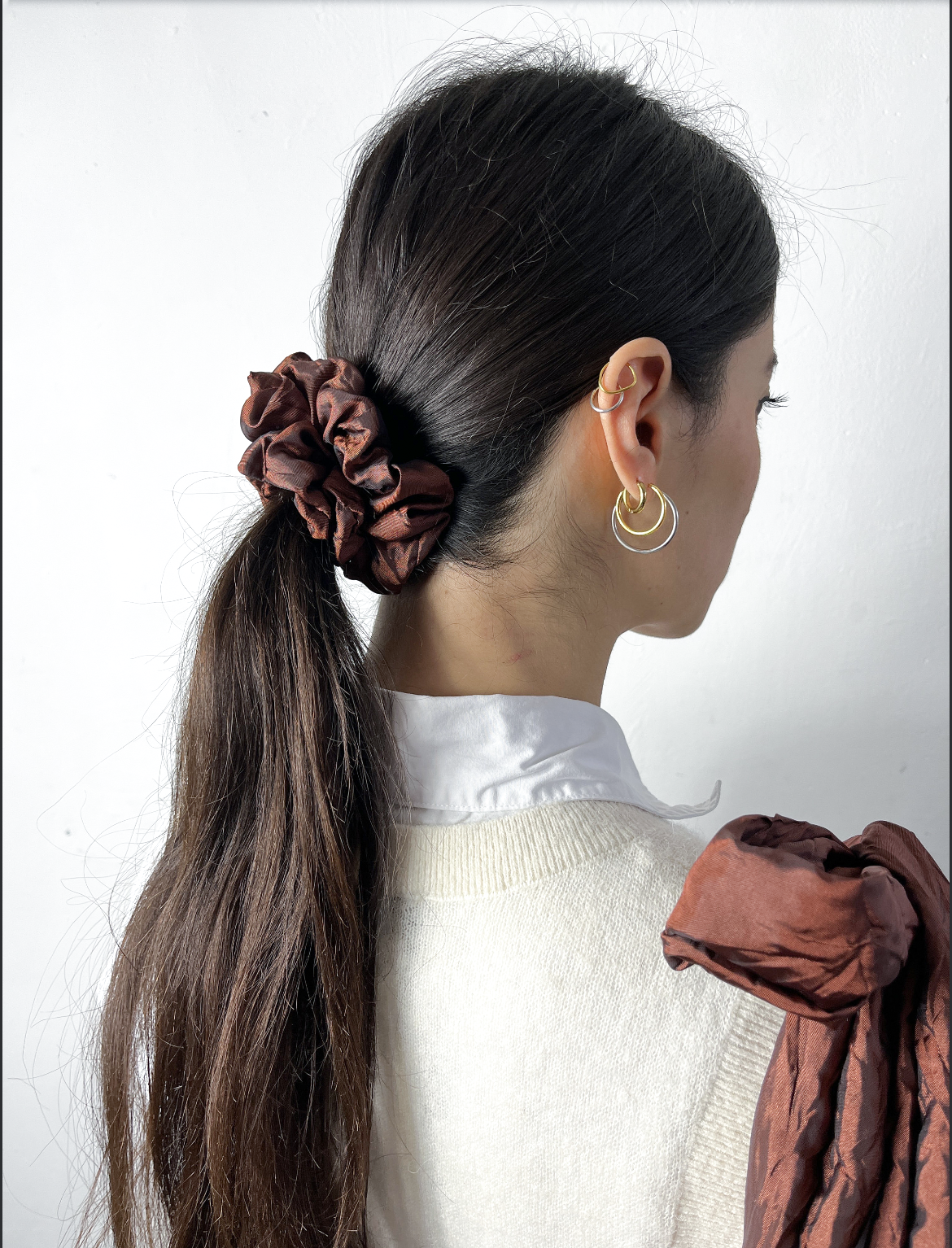 Cioccolato Sling Bag in brown Crinkle Taffeta